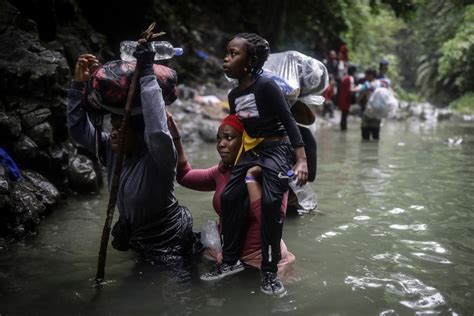 Migrants crossing dense Darien jungle at Colombia-Panama border find increasingly organized route
